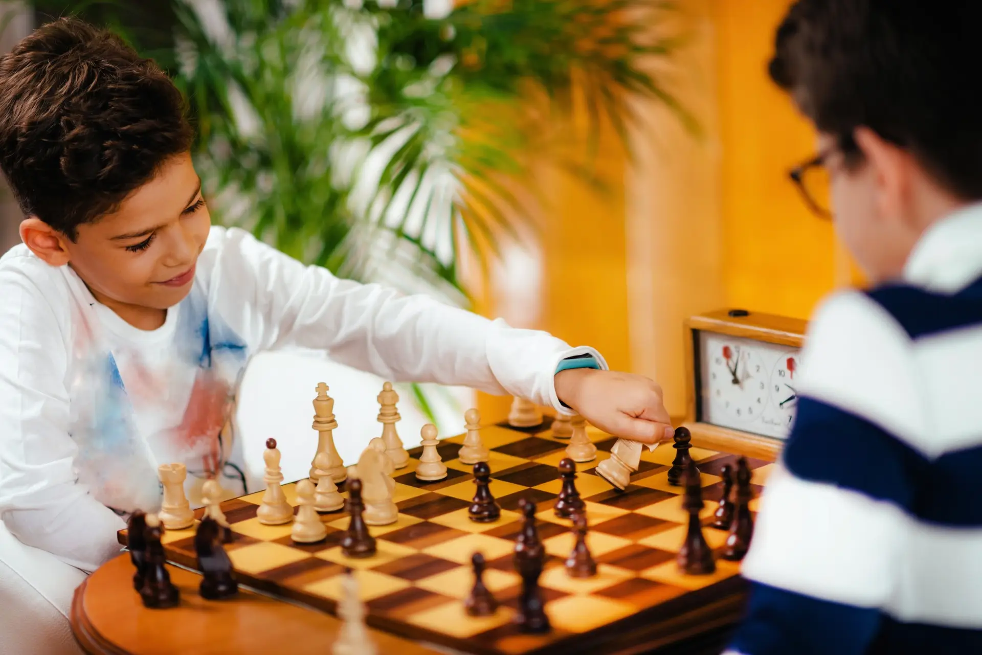 School boys playing chess